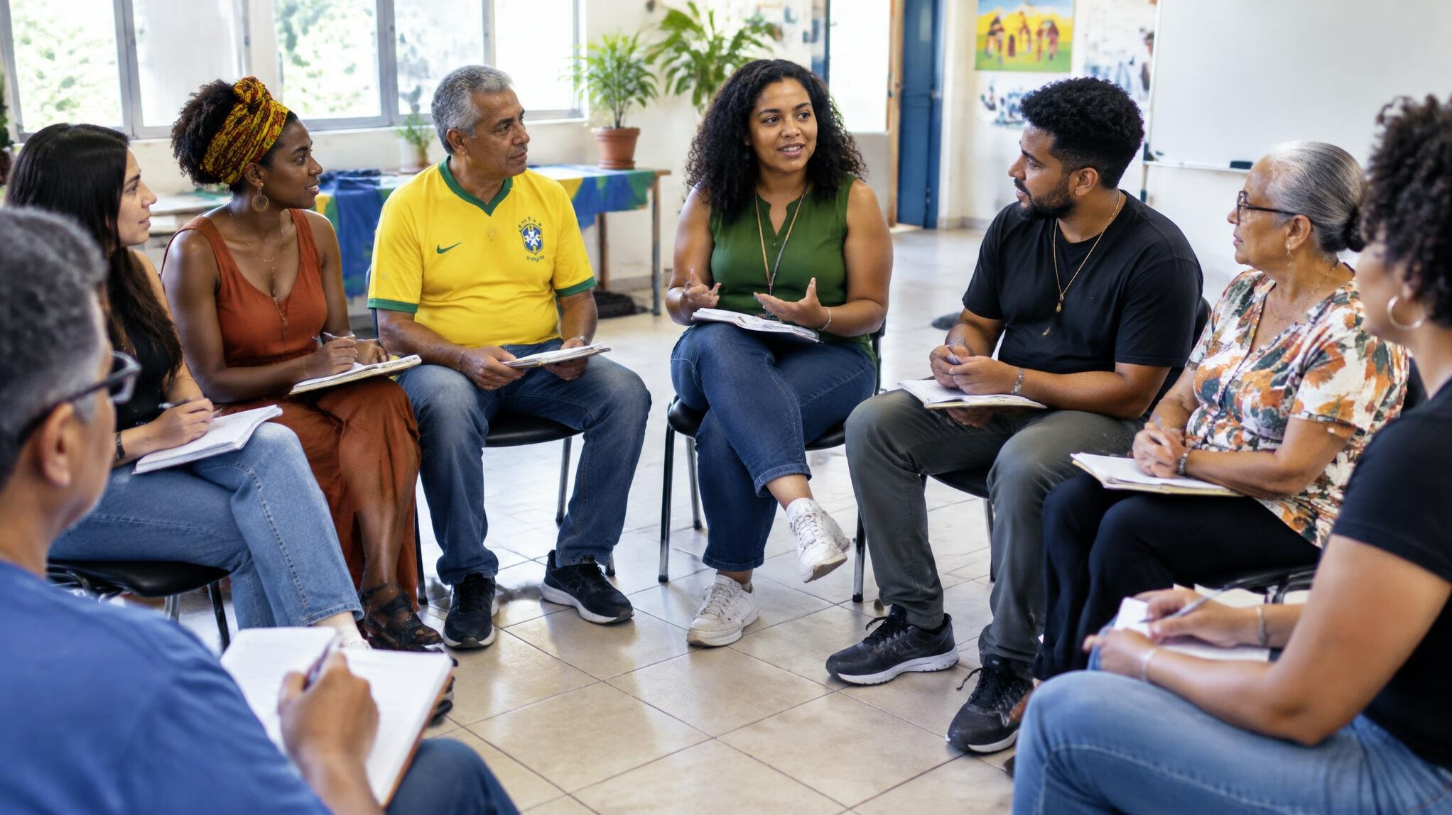 Diverse group of adults participating in a group discussion workshop